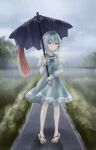  0801_nu 1girl blue_eyes blue_hair blue_skirt blue_vest blurry blurry_background brown_footwear closed_mouth commentary cross-laced_clothes full_body geta heterochromia highres holding holding_umbrella karakasa_obake looking_at_viewer outdoors purple_umbrella rain red_eyes shirt short_hair skirt solo standing tatara_kogasa tongue touhou umbrella vest white_shirt 