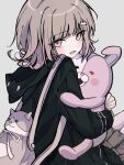  1girl :d animal_bag backpack bag black_jacket brown_hair cat_bag danganronpa_(series) danganronpa_2:_goodbye_despair galaga hair_ornament highres hood hooded_jacket jacket leaf_(identityv_leaf) long_sleeves looking_at_viewer medium_hair monomi_(danganronpa) nanami_chiaki pink_bag pink_eyes ribbon shirt skirt smile white_shirt 