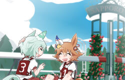  2girls :d ^_^ animal_ears arm_behind_head arm_up beer_hsk blue_sky blurry blurry_background blush brown_hair closed_eyes clouds commentary_request daruma_doll day depth_of_field flower grey_hair hair_between_eyes hair_flower hair_ornament horse_ears horse_girl horse_tail matikanefukukitaru_(umamusume) multiple_girls original_race_uniform_(umamusume) outdoors puffy_short_sleeves puffy_sleeves race_bib red_flower red_shorts seiun_sky_(umamusume) shide shirt short_sleeves shorts sky smile sweat tail umamusume white_shirt yellow_flower 