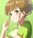  1girl 46_crt absurdres black_hair blunt_bangs blush breasts brown_hair closed_mouth commentary_request finger_to_cheek green_background green_shirt grey_eyes hair_bun highres long_hair miyake_hinata shirt short_sleeves simple_background single_hair_bun smile solo sora_yori_mo_tooi_basho t-shirt 