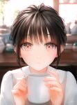  1girl absurdres backlighting black_hair bluch blurry blurry_background breasts coffee_mug commentary_request cup hair_bun highres holding holding_cup indoors looking_at_viewer medium_breasts mug ojay_tkym original parted_lips portrait red_eyes signature solo sunlight window 