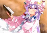  1girl blush book crescent crescent_hat_ornament dress hair_between_eyes hat hat_ornament highres holding holding_book long_hair long_sleeves mob_cap open_book open_mouth patchouli_knowledge pink_dress pink_headwear purple_hair qqqrinkappp solo touhou violet_eyes 