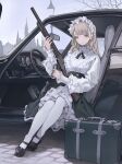  1girl absurdres black_footwear blonde_hair brown_eyes car closed_mouth commentary frills green_skirt gun highres holding holding_gun holding_weapon koh_(minagi_kou) lamppost long_hair long_sleeves motor_vehicle original pantyhose shirt sitting skirt solo steering_wheel suitcase tree weapon white_pantyhose white_shirt 