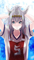  1girl ahoge animal_ears blue_eyes closed_mouth commentary ear_ornament frown grey_hair gym_shirt hair_ornament highres horse_ears horse_girl kasamatsu_tracen_training_uniform long_hair looking_at_viewer oguri_cap_(umamusume) race_bib remoruto shirt short_sleeves solo t-shirt tying_hair umamusume umamusume:_cinderella_gray upper_body white_shirt 