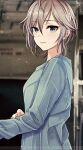  1girl alternate_costume anastasia_(idolmaster) blurry blurry_background blush breasts grey_hair highres idolmaster idolmaster_cinderella_girls light_smile long_sleeves looking_at_viewer looking_to_the_side medium_breasts photo_background popon_ta short_hair solo 