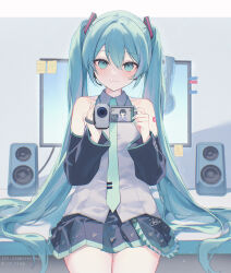  1girl bare_shoulders black_skirt black_sleeves blue_eyes blue_hair blue_necktie camcorder closed_mouth collared_shirt commentary_request detached_sleeves grey_shirt hair_between_eyes hatsune_miku headphones headphones_removed holding long_hair long_sleeves monitor necktie pleated_skirt shirt silltare skirt sleeveless sleeveless_shirt smile solo speaker tie_clip twintails twitter_username very_long_hair video_camera vocaloid watermark web_address wide_sleeves 