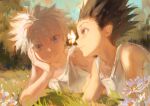  2boys blue_eyes bug butterfly commentary_request flower gon_freecss hand_on_own_face highres hunter_x_hunter killua_zoldyck looking_at_animal male_focus morning multiple_boys on_grass outdoors painting_(medium) scenery spiky_hair tank_top teeth traditional_media yu_333o 