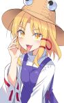  1girl blonde_hair blush brown_headwear e.o. hair_ribbon hat highres long_hair long_sleeves moriya_suwako open_mouth purple_vest red_ribbon ribbon shirt simple_background solo tongue tongue_out touhou tress_ribbon upper_body vest white_background white_shirt wide_sleeves yellow_eyes 