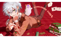 1boy absurdres alternate_costume blush book book_stack brown_cardigan brown_pants cardigan checkered_background collared_shirt commentary_request english_text foot_out_of_frame green_eyes grey_hair head_rest heart heterochromia highres letter letterboxed lying male_focus matochi_(fa) murakumo_kagetsu nijisanji on_stomach pants pencil_case red_background red_ribbon red_shoes ribbon shadow shirt shoes short_hair simple_background solo stuffed_animal stuffed_toy teddy_bear the_pose violet_eyes virtual_youtuber watakumo_(murakumo_kagetsu) white_shirt 