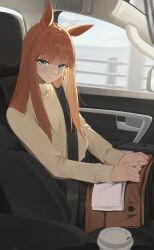  1girl animal_ears aqua_eyes blush brown_sweater car coffee cup disposable_coffee_cup disposable_cup highres horse_ears horse_girl long_hair looking_at_viewer motor_vehicle ningen_gokko on_car orange_hair seatbelt silence_suzuka_(umamusume) sitting solo sweater umamusume 