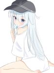  1girl absurdres anchor_symbol black_headwear blue_eyes commentary_request from_behind hibiki_(kancolle) highres kantai_collection long_hair looking_at_viewer looking_back shirasu_(sirasuillust) shirt sitting solo t-shirt translation_request wariza white_hair white_shirt 