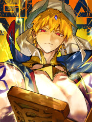  1boy arabian_clothes blonde_hair blue_vest character_name closed_mouth dingir_(fate) earrings fate/grand_order fate_(series) gilgamesh_(caster)_(fate) gilgamesh_(fate) hair_between_eyes hat highres jewelry looking_at_viewer male_focus red_eyes short_hair shoulder_tattoo simple_background stone_tablet suzuhi_(fullprayer) tattoo turban vest yellow_background 