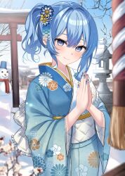  1girl alternate_costume asymmetrical_sidelocks blue_eyes blue_hair blue_kimono blue_nails blurry blurry_background closed_mouth commentary day depth_of_field double-parted_bangs english_commentary floral_print floral_print_kimono flower hair_between_eyes hair_flower hair_ornament highres hololive hoshimachi_suisei japanese_clothes kanzashi kimono kohaku_(csacu) lace-trimmed_kimono lace_trim long_sleeves looking_at_viewer nail_polish new_year obi outdoors own_hands_clasped own_hands_together palms_together ponytail praying print_kimono rope sash shimenawa short_hair shrine sidelocks smile snowman solo star_(symbol) star_in_eye symbol_in_eye torii tsumami_kanzashi virtual_youtuber white_kimono white_sash wide_sleeves 