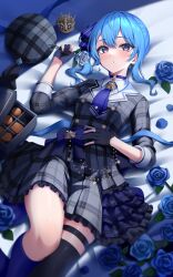  1girl absurdres belt blue_belt blue_bow blue_choker blue_eyes blue_flower blue_hair blue_necktie blue_rose bow box box_of_chocolates breasts choker commentary_request crown flower fuyumichi gloves hat highres holding holding_flower hololive hoshimachi_suisei hoshimachi_suisei_(1st_costume) lying mini_crown necktie on_back parted_lips partially_fingerless_gloves plaid_clothes plaid_hat plaid_shirt plaid_skirt rose shirt single_thighhigh skirt small_breasts solo star_(symbol) star_in_eye symbol_in_eye thigh-highs thigh_strap unworn_hat unworn_headwear virtual_youtuber 