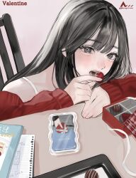  1girl absurdres aoiame arm_rest black_hair box cellphone chair chocolate commentary_request fingernails food grey_eyes highres holding holding_chocolate holding_food long_hair looking_at_viewer notebook off_shoulder on_chair open_mouth original phone red_sweater sitting smartphone solo straight_hair sweater table tearing_up upper_body valentine 
