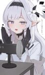  1girl asmr azuki_(az_my) binaural_microphone black_gloves black_hairband blue_archive blush flower gloves grey_hair hair_flower hair_ornament hairband halo heart highres himari_(blue_archive) long_hair long_sleeves looking_at_viewer microphone mole mole_under_eye open_mouth pointy_ears simple_background solo translation_request upper_body very_long_hair violet_eyes white_background white_flower 