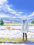  1girl blue_scarf blue_sky boots brown_footwear clouds coat commentary day earrings elf english_commentary frieren grass highres jewelry long_hair long_sleeves mountain outdoors pantyhose pointy_ears scarf scenery sky snow solo sousou_no_frieren standing theta_(theta456697010) tree white_coat white_hair wide_shot winter_clothes 