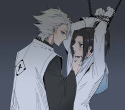  1boy 1girl alternate_universe aqua_eyes black_eyes black_hair bleach bleach:_sennen_kessen-hen bound bound_wrists capelet chain commentary english_commentary frown gloves grey_hair hand_on_another's_chin haori highres hitsugaya_toushirou japanese_clothes kurosaki_karin quincy_(bleach) serious shihakusho silegesi taichou_haori white_capelet white_gloves wide_sleeves 