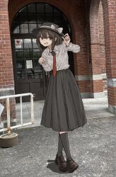  1girl adjusting_clothes adjusting_headwear arch bike_rack_barricade black_hat black_shoes black_skirt black_socks bow brick brown_eyes brown_hair building double-parted_bangs grey_bow grey_ribbon grey_shirt guard_rail hair_between_eyes hair_bow hat hat_bow hat_ribbon highres kashiwada_kiiho long_skirt long_sleeves low-tied_sidelock medium_hair necktie open_mouth photo_background pleated_skirt red_necktie ribbon road rust shirt shoes single_sidelock skirt smile socks solo touhou usami_renko walking white_bow window 