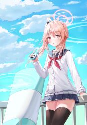  1girl absurdres ahoge arm_at_side ballistic_shield black_sailor_collar black_shirt black_thighhighs blue_archive blue_sky blush bright_pupils buttons cardigan clouds commentary cowboy_shot day drink_carton halo hand_up highres holding holding_milk_carton long_hair looking_at_viewer milk_carton miniskirt natsu_(blue_archive) neckerchief nomi_(gpjg7877) outdoors parted_lips pink_hair pink_halo pleated_skirt red_eyes red_neckerchief ring_of_light_(blue_archive) sailor_collar school_uniform serafuku shield shirt side_ponytail sidelocks skirt sky sleeves_past_wrists solo thigh-highs trinity_general_school_logo white_cardigan white_pupils zettai_ryouiki 