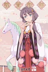  1girl 2026 animal blush brown_hair chinese_zodiac closed_mouth commentary_request ema flower_symbol green_eyes hair_between_eyes hair_ornament hair_tubes hakama holding horse japanese_clothes kimono looking_at_viewer miko new_year original porupurucha red_hakama solo thick_eyebrows white_horse white_kimono wide_sleeves year_of_the_horse 