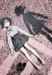  1girl ankle_socks black_hair black_skirt buttons cherry_blossoms collared_shirt commentary loafers long_sleeves lying on_back original petals pink_petals pleated_skirt shirt shoes short_hair skirt smile socks solo unworn_shoes white_shirt yuzua 