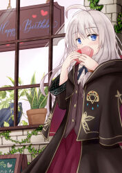  1girl ahoge blue_eyes box brown_robe collared_shirt commentary_request elaina_(majo_no_tabitabi) elumina1213 grey_hair hair_between_eyes heart-shaped_box highres holding holding_box long_hair looking_at_viewer majo_no_tabitabi outdoors plant potted_plant red_skirt robe shirt skirt solo valentine white_shirt window 
