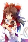  1girl beni_shake bow brown_eyes brown_hair crossed_arms detached_collar feathers hair_bow hair_tubes hakurei_reimu long_hair long_sleeves shirt simple_background skirt skirt_set solo touhou white_background wide_sleeves 