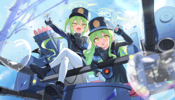  2girls 2windrill absurdres armband balloon black_boots black_tail blue_archive blue_armband blue_hat blue_jacket blurry blurry_foreground blush boots buttons chinese_commentary commentary cropped_jacket crossed_legs demon_tail depth_of_field double-breasted fang gloves green_hair green_halo hair_between_eyes halo hat heart_balloon highres hikari_(blue_archive) jacket leaning_forward long_hair long_sleeves looking_at_viewer multiple_girls nozomi_(blue_archive) open_mouth outdoors pantyhose peaked_cap pointy_ears robot rocket_launcher siblings sidelocks sitting skin_fang smile tail thumbs_up train_conductor twins twintails weapon white_gloves white_pantyhose yellow_eyes yellow_halo 