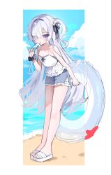  1girl absurdres bare_shoulders beach blue_shorts border camisole clouds collar food full_body hair_over_one_eye highres holding holding_food holding_popsicle holding_swim_ring long_hair looking_at_viewer mahou_shoujo_no_majo_saiban natsume_an-an ocean popsicle see-through_hair shore shorts sky solo standing swim_ring tess_(88884) tongue tongue_out violet_eyes white_border white_camisole white_hair white_sand 