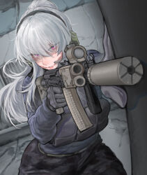  1girl absurdres ak-102 ammunition_pouch assault_rifle black_gloves black_pants blue_jacket bulletproof_vest ear_protection foregrip gloves grey_gloves grey_hair gun hand_on_wall hands_up high_ponytail highres holding holding_gun holding_weapon jacket kalashnikov_rifle laser_sight long_sleeves m4skedboi original pants parted_lips pink_eyes ponytail pouch red_dot_sight rifle scar scar_on_face solo suppressor tongue tongue_out weapon 