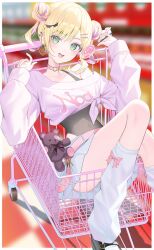  1girl :d belt black_shoes blonde_hair blurry blurry_background border breasts candy choker commentary covered_navel double_bun ear_piercing earrings food green_eyes hair_bun hair_ornament hairclip highres holding holding_candy holding_food holding_lollipop indoors jewelry knees_up kurumi_noah lollipop long_sleeves looking_at_viewer loose_socks miniskirt multicolored_hair outside_border parallel_hairclips piercing pink_belt pink_choker pink_sweater purple_hair ryuya shoes shopping_cart single_bare_shoulder skirt smile socks solo spiked_ear_piercing stuffed_animal stuffed_toy supermarket sweater teddy_bear tied_sweater untranslatable_commentary virtual_youtuber vspo! white_border white_skirt 