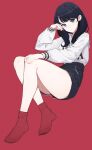  1girl absurdres black_hair blue_eyes breasts gridman_universe highres lan_mao_akko long_hair looking_at_viewer red_background red_socks shorts simple_background socks solo ssss.gridman takarada_rikka 