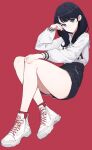  1girl absurdres black_hair blue_eyes breasts gridman_universe highres lan_mao_akko long_hair looking_at_viewer red_background red_socks shoes shorts simple_background sneakers socks solo ssss.gridman takarada_rikka 