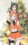  2girls annin_musou aqua_eyes black_hair bridal_gauntlets brown_eyes carrying christmas_tree cowboy_shot fur-trimmed_headwear fur_trim hair_ornament hairclip hat highres inagi_(kancolle) kantai_collection long_hair multiple_girls official_alternate_costume orange_hair orange_headwear orange_shirt orange_skirt party_hat salmon_(kancolle) santa_hat shirt shoulder_carry skirt sleeveless sleeveless_shirt star_(symbol) twintails 