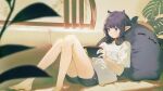  1girl artist_name bare_legs barefoot black_shorts blurry character_pillow couch depth_of_field dolphin_shorts frown headphones headphones_around_neck highres hololive hololive_english indoors knees_together_feet_apart ninomae_ina&#039;nis ninomae_ina&#039;nis_(5th_costume) ninomae_ina&#039;nis_(artist) nintendo_switch on_couch plant playing_games pointy_ears purple_hair reclining shirt short_hair shorts signature sitting solo t-shirt takodachi_(ninomae_ina&#039;nis) tentacle_hair violet_eyes virtual_youtuber white_shirt window 