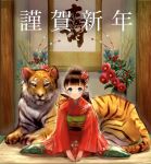  1girl animal blue_eyes blush bow brown_hair chinese_zodiac flower hair_bun hair_ornament highres ilikegoya indoors japanese_clothes kanzashi kimono long_sleeves looking_at_viewer new_year on_floor original sitting smile solo tiger translation_request wide_sleeves year_of_the_tiger 
