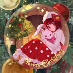  1girl absurdres arima_kana beret bob_cut christmas christmas_tree dress hat hat_ribbon highres hug inverted_bob looking_at_viewer merry_christmas oshi_no_ko rabbit red_dress red_eyes red_ribbon redhead ribbon shirt short_hair sitting smile solo white_shirt xiang_yu_pai 