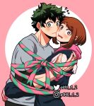  1boy 1girl blush boku_no_hero_academia bound brown_eyes brown_hair cheek-to-cheek couple flying_sweatdrops freckles green_eyes green_hair grey_shirt heads_together hetero highres hood hoodie hug instagram_logo instagram_username midoriya_izuku mu_1_2 pink_background scar shirt short_hair simple_background tied_up_(nonsexual) twitter_logo twitter_username uraraka_ochako 