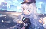  1girl :3 ainy black_gloves blue_eyes blue_sky blurry blurry_background blush building coffee commentary_request cup disposable_cup dot_nose dutch_angle gloves goddess_of_victory:_nikke grey_hair hat highres holding holding_cup long_hair looking_at_viewer poli_(nikke) police police_hat police_uniform policewoman road scarf short_sleeves sky skyscraper smile snow solo uniform upper_body visible_air walkie-talkie white_scarf 