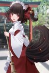  1girl absurdres animal_ear_fluff animal_ears bamboo bell black_hair blurry blurry_background bow broom colored_inner_hair commentary_request depth_of_field from_behind hair_bell hair_bow hair_ornament hakama hakama_skirt highres holding holding_broom japanese_clothes jingle_bell kimono long_sleeves looking_at_viewer looking_back miko multicolored_hair one_side_up original red_bow red_eyes red_hakama redhead sapphire_(sapphire25252) skirt solo stairs stone_stairs tail white_kimono wide_sleeves 