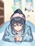  1girl absurdres ado_(utaite) black_hair blue_eyes blue_hoodie blush cellphone chando_(ado) closed_mouth cloud_nine_inc commentary_request folded_hair hair_between_eyes highres holding holding_phone hood hoodie indoors long_sleeves lying mole mole_under_eye on_stomach phone sidelocks smartphone solo sweatdrop tsukuno_tsuki utaite 