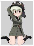  1girl anchovy_(girls_und_panzer) anzio_military_uniform arm_support arm_up belt bespectacled black-framed_eyewear black_belt black_footwear black_headwear black_shirt boots braid braided_ponytail breast_pocket breasts brown_eyes dress_shirt full_body girls_und_panzer glasses goggles goggles_on_headwear green_hair grey_background grey_jacket grey_skirt hand_on_headwear helmet jacket kayabakoro knee_boots knife leaning_back long_hair long_sleeves looking_at_viewer medium_breasts military_uniform miniskirt pocket red_eyes rimless_eyewear round_eyewear shirt single_braid sitting skirt solo uniform wariza wing_collar 