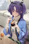  1girl absurdres blue_archive bowl chopsticks couch eating fingernails floor food fruit halo highres holding holding_bowl holding_chopsticks indoors jyon_(xrmn8737) kotatsu long_hair looking_at_viewer mandarin_orange mechanical_halo mochi noa_(blue_archive) pen purple_hair ribbed_sweater solo sweater table turtleneck turtleneck_sweater two_side_up violet_eyes white_sweater yuuka_(blue_archive) 