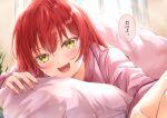  1girl blush bocchi_the_rock! close-up foreshortening green_eyes highres indoors kikugawa_roku kita_ikuyo long_hair looking_at_viewer lying on_stomach open_mouth pillow pink_shirt reaching reaching_towards_viewer redhead shirt solo speech_bubble translated under_covers 