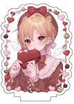  1boy blush box brown_shirt candy chocolate cookie drawn_wings earrings ensemble_stars! food gift gift_box grey_background heart heart-shaped_chocolate holding holding_gift jewelry long_sleeves looking_at_viewer male_focus moka_(210727) nito_nazuna open_mouth shirt simple_background solo 