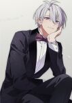  1boy ahoge aiue_o_eiua black_jacket black_pants bow bowtie brown_background closed_mouth formal grey_hair head_rest highres idolish7 jacket male_focus osaka_sougo pants red_bow red_bowtie shirt short_hair simple_background smile solo violet_eyes watch watch white_shirt 