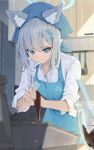  1girl absurdres animal_ear_fluff animal_ears apron blue_apron blue_archive blue_eyes blush breasts cooking cross_hair_ornament extra_ears grey_hair hair_ornament halo highres long_hair medium_hair mismatched_pupils ningen_gokko shiroko_(blue_archive) solo wolf_ears 