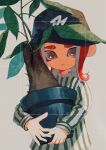  1boy black_headwear closed_mouth commentary_request flower_pot grey_background grey_eyes hat highres holding holding_flower_pot leaf looking_at_viewer medium_hair octoling_boy octoling_player_character plant potted_plant pppmepl redhead simple_background solo splatoon_(series) splatoon_3 standing tentacle_hair thick_eyebrows 