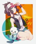  1girl baseball_cap brown_hair closed_mouth copyright_name hat high_ponytail highres hilda_(pokemon) long_hair looking_at_viewer oshawott pokemon pokemon_bw ponytail shifumame shirt shorts sleeveless sleeveless_shirt solo 